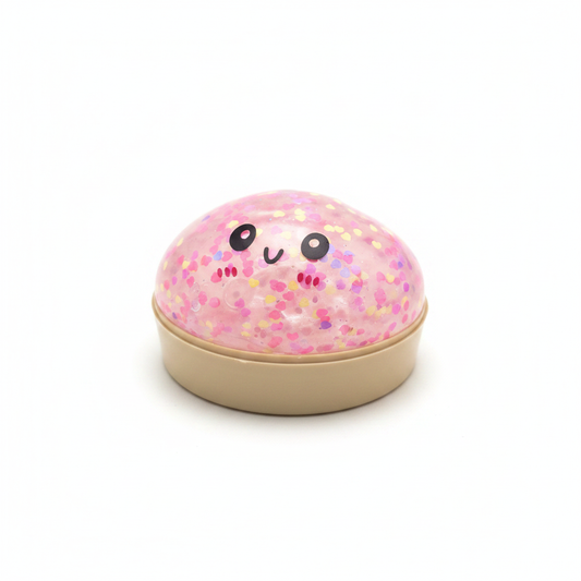 Glob squishy roz cu glitter colorat și față kawaii zâmbitoare